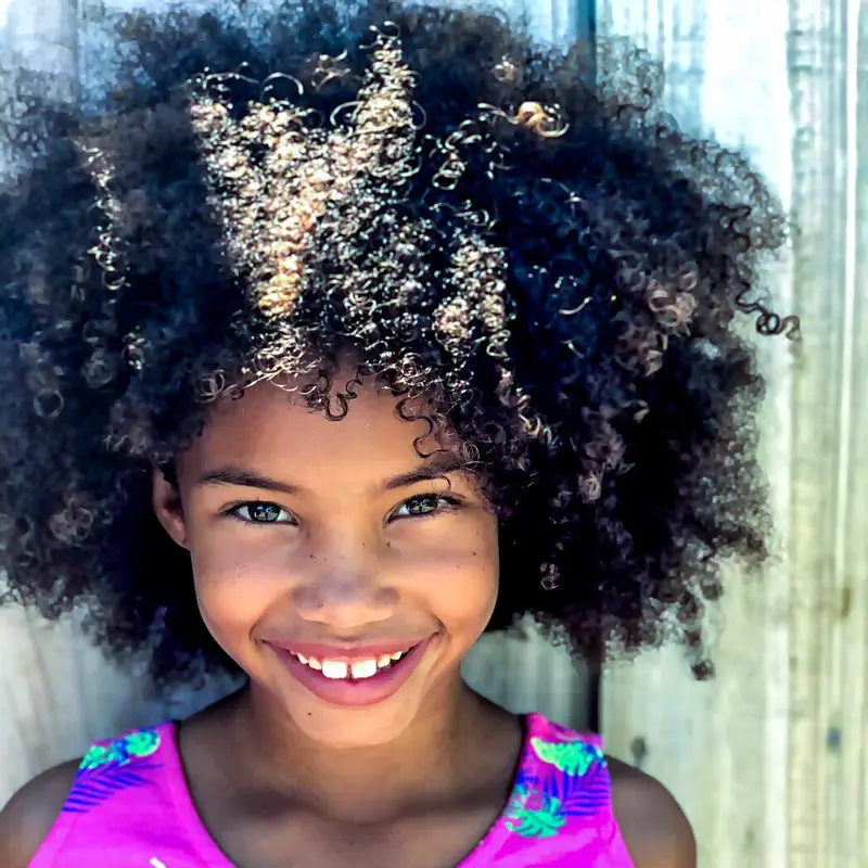 girl smiling into camera
