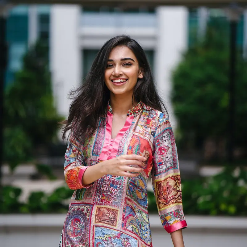 Indian girl with colourful outfit on happy and smiling