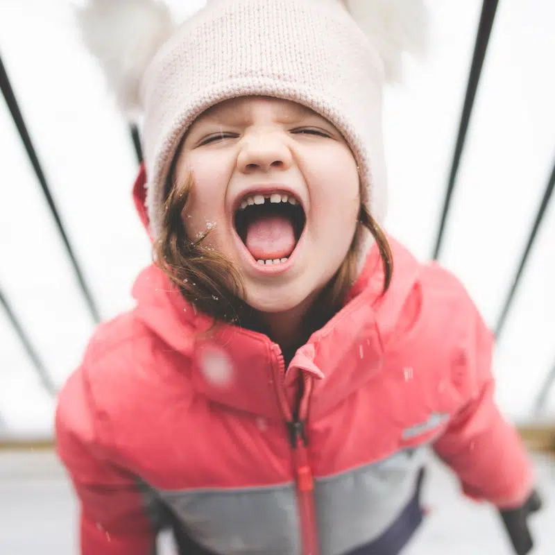 Kid having a tantrum outside, showing lack of self-regulation skills